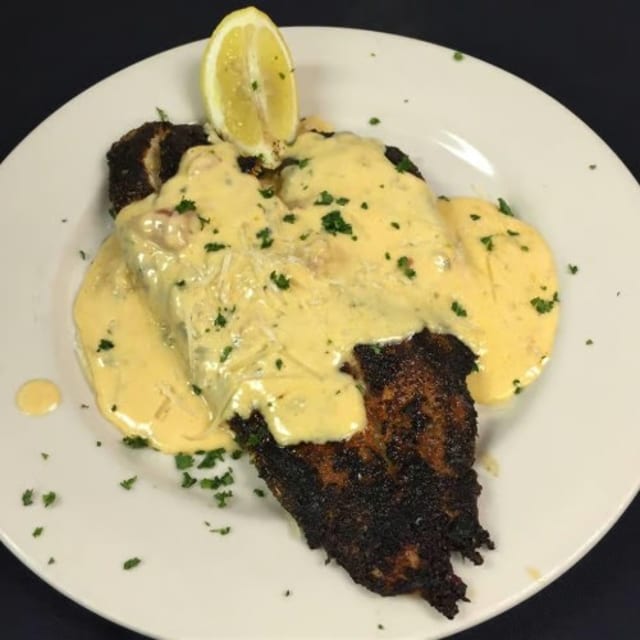 REDFISH WITH CRAWFISH CREAM SAUCE.